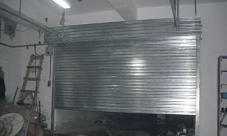 專業(yè)安裝維修制作卷簾門車庫門白鋼門型材門肯德基門